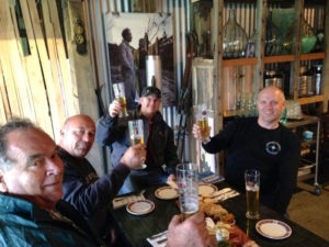 boys relax at a local distillery